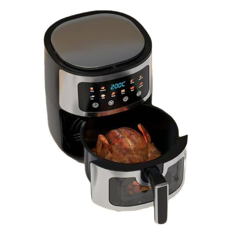 Digital air fryer with a roasted chicken inside on a white background